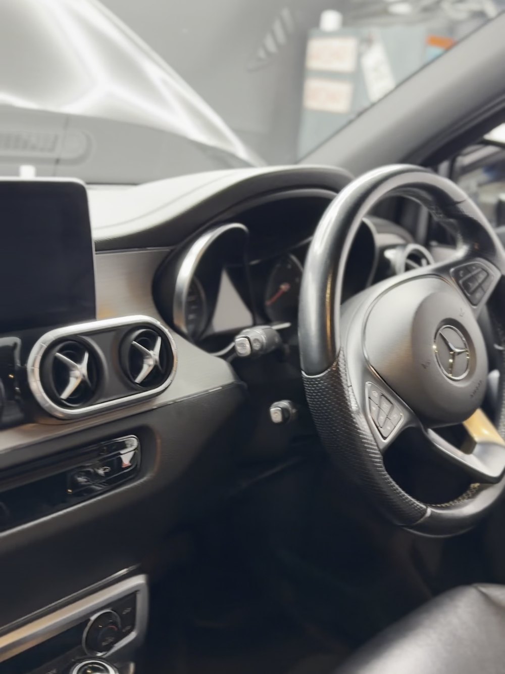 Mercedes-Benz X-Class dashboard and steering wheel after an interior detail