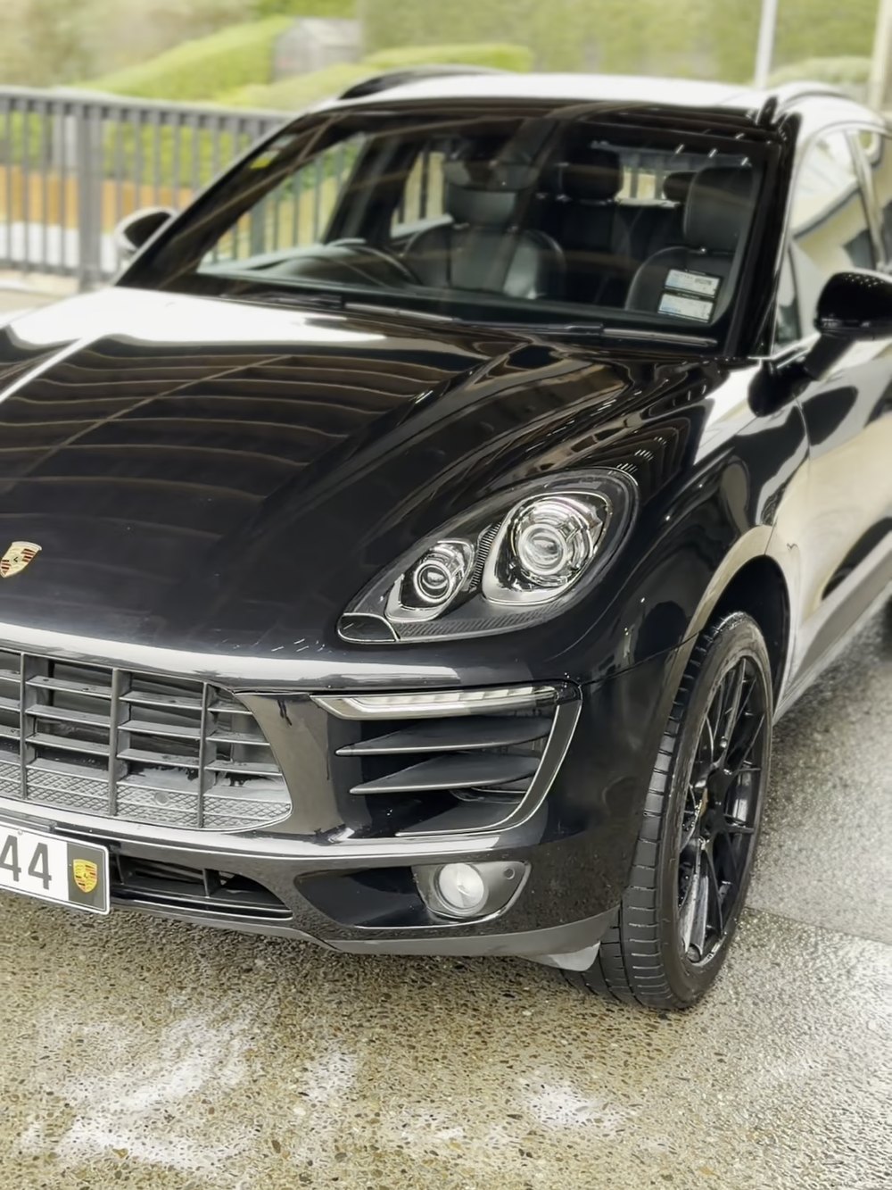 Porsche Macan in black after an exterior detail